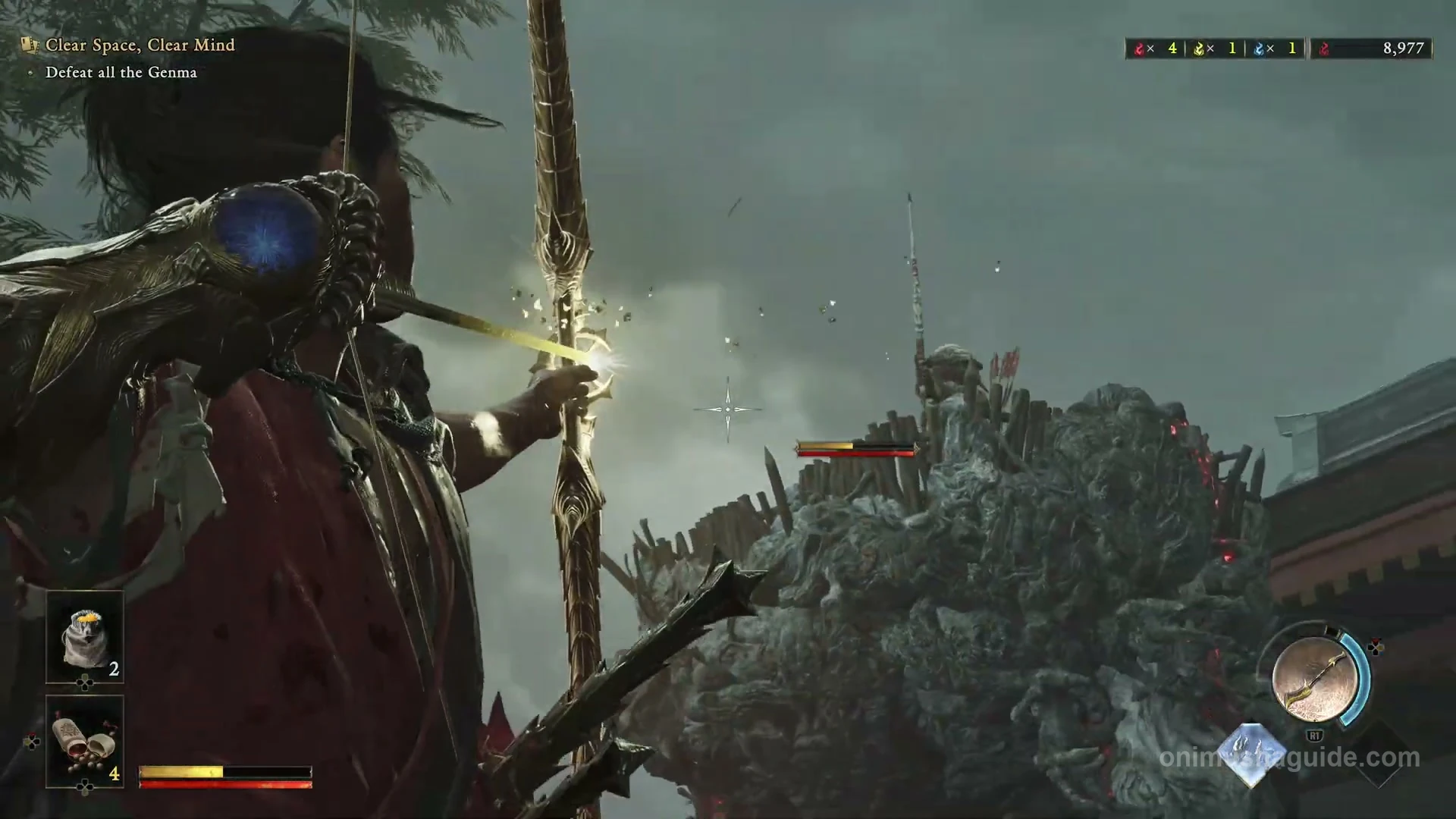 Bow aimed at a ranged Genma perched on the corrupted arch above the courtyard