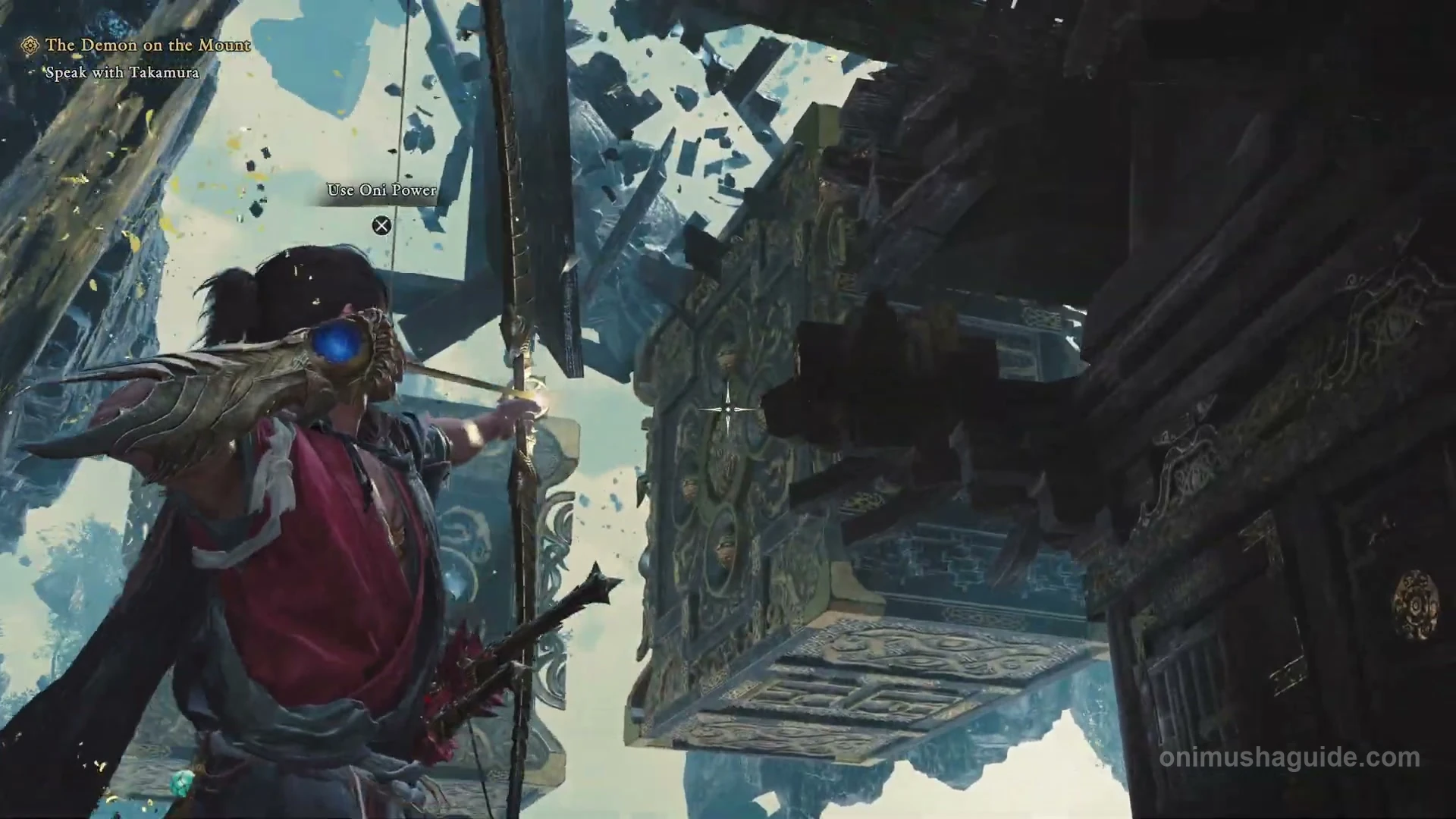 Bow aimed at the higher block target beneath the projecting wooden frame