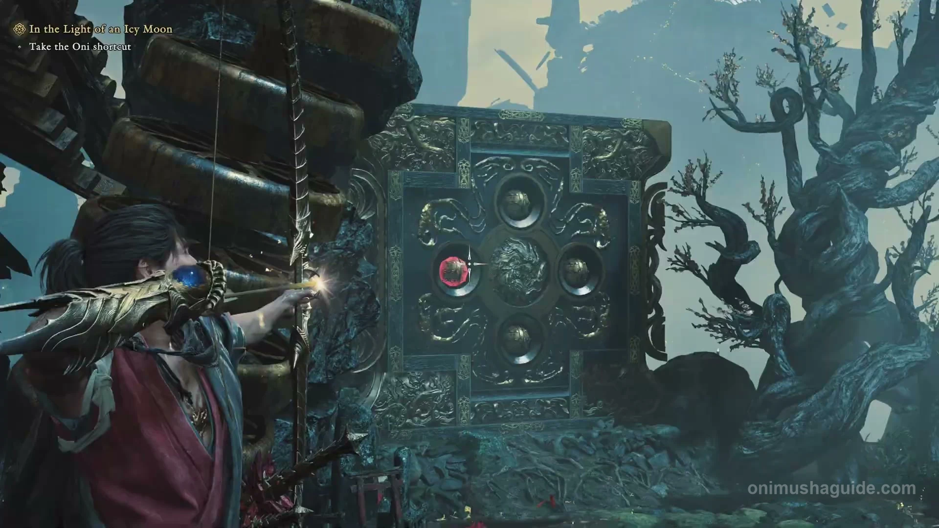 The upright switch block beside the stacked gold-disc pillar