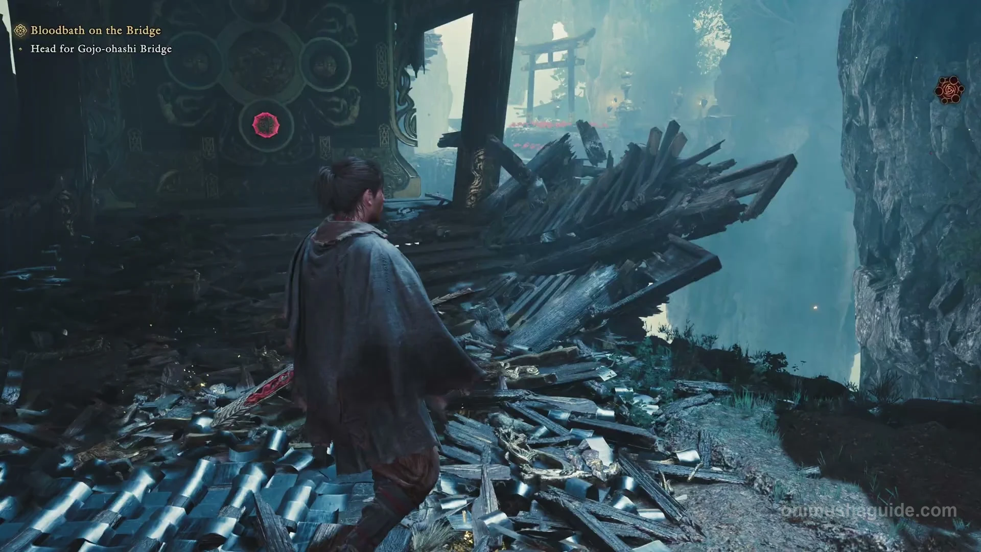 Red circular bow target on the block obstructing the first ruined doorway