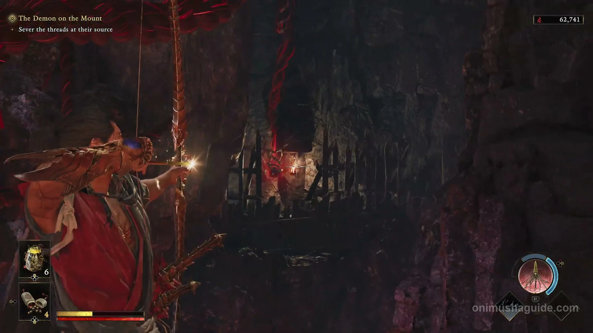 Bow aimed across the cavern at the first Weaver beside the wooden bars