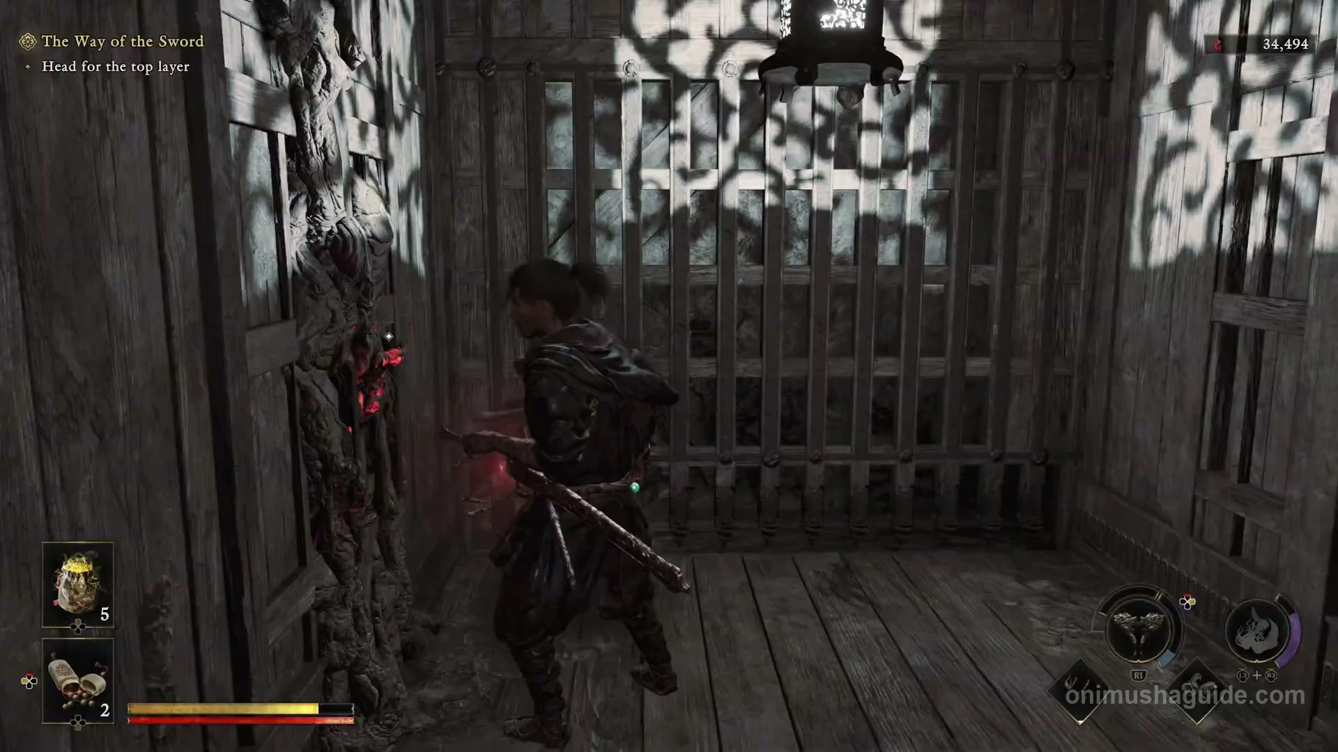 Musashi operating the red switch on the left side of the first castle lift