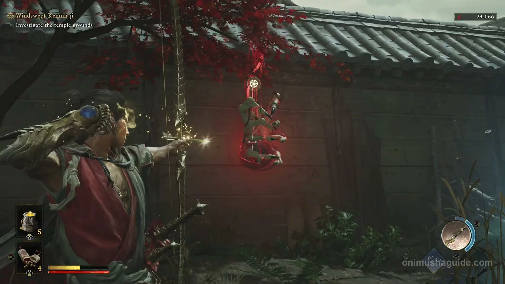Oni Bow aimed at the first Weaver hanging on the plaster wall in the narrow recess